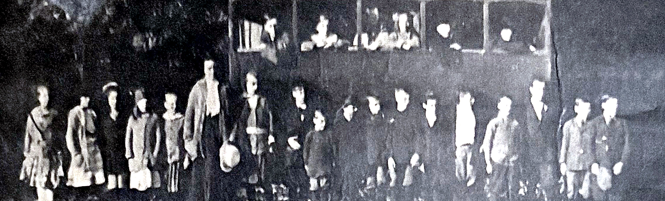 Pupils stand beside Sussex County’s first motorized school bus, a 1918 Republic.