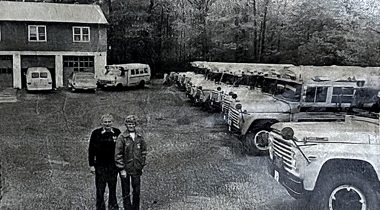 Duane and Louise Clark standing in their bus yard at Beaver Lake in 1979.